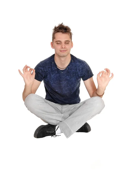 Handsome Young Man Gray Jeans Sitting Floor His Eyes Closed — Stock Photo, Image