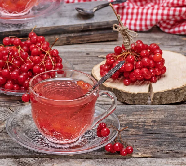 Heißer Viburnum Tee Einer Durchsichtigen Tasse Mit Henkel Und Untertasse — Stockfoto