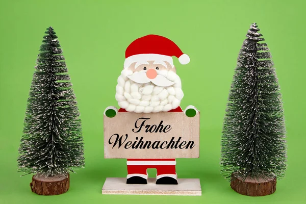 Decorative Wooden Santa Clause Holding Board German Text Frohe Weihnachten — Stock Photo, Image