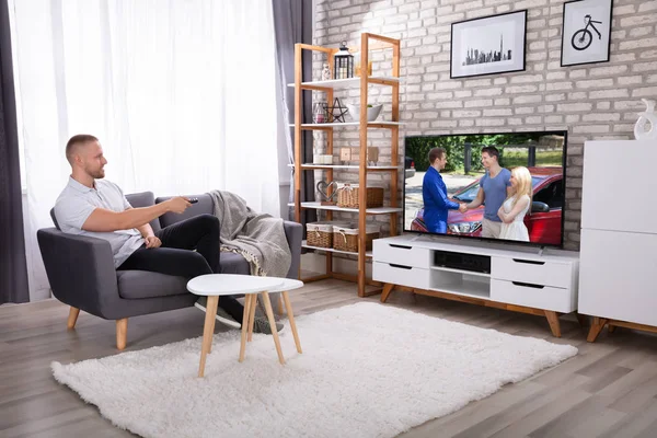 Man Sitting Sofa Watching Television Home — Stock Photo, Image