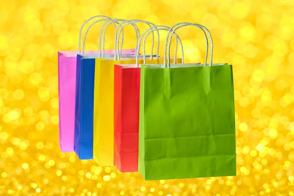 Colorful Paper Bags Lined Row — Stock Photo, Image