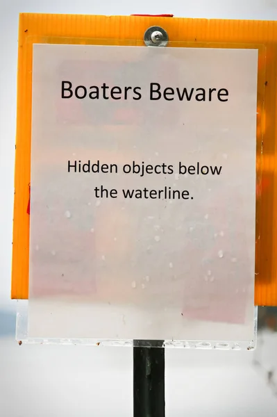 Boaters Beware Hidden Object Water Sign — Stock Photo, Image