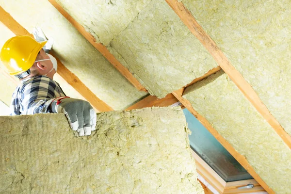 Man Installing Thermal Roof Insulation Layer Using Mineral Wool Panels — Stock Photo, Image