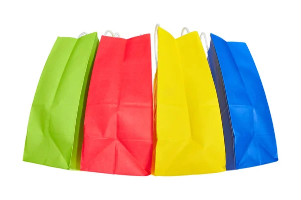 Four Colorful Paper Bags Stand Side Side Front White Background — Stock Photo, Image