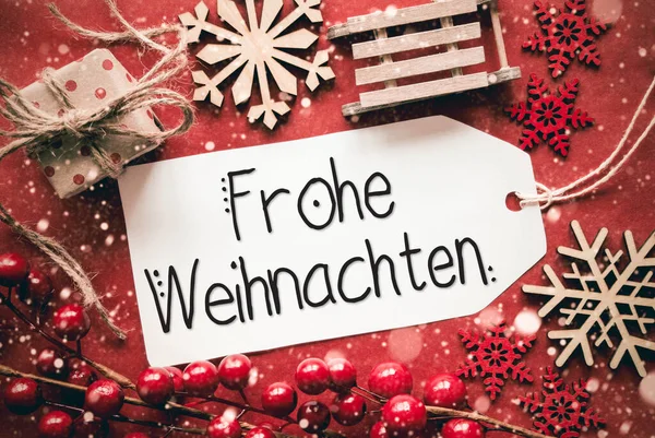 ドイツ書道 Frohe アドベント手段メリー クリスマス ラベル ギフト そりと雪の結晶のような赤いクリスマス装飾とフラット レイアウト — ストック写真