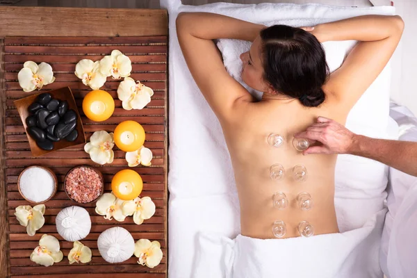 Relaxed Young Woman Receiving Cupping Treatment Her Back Spa — Stock Photo, Image