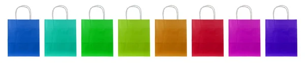 Eight Colorful Paper Bags Stand Side Side — Stock Photo, Image