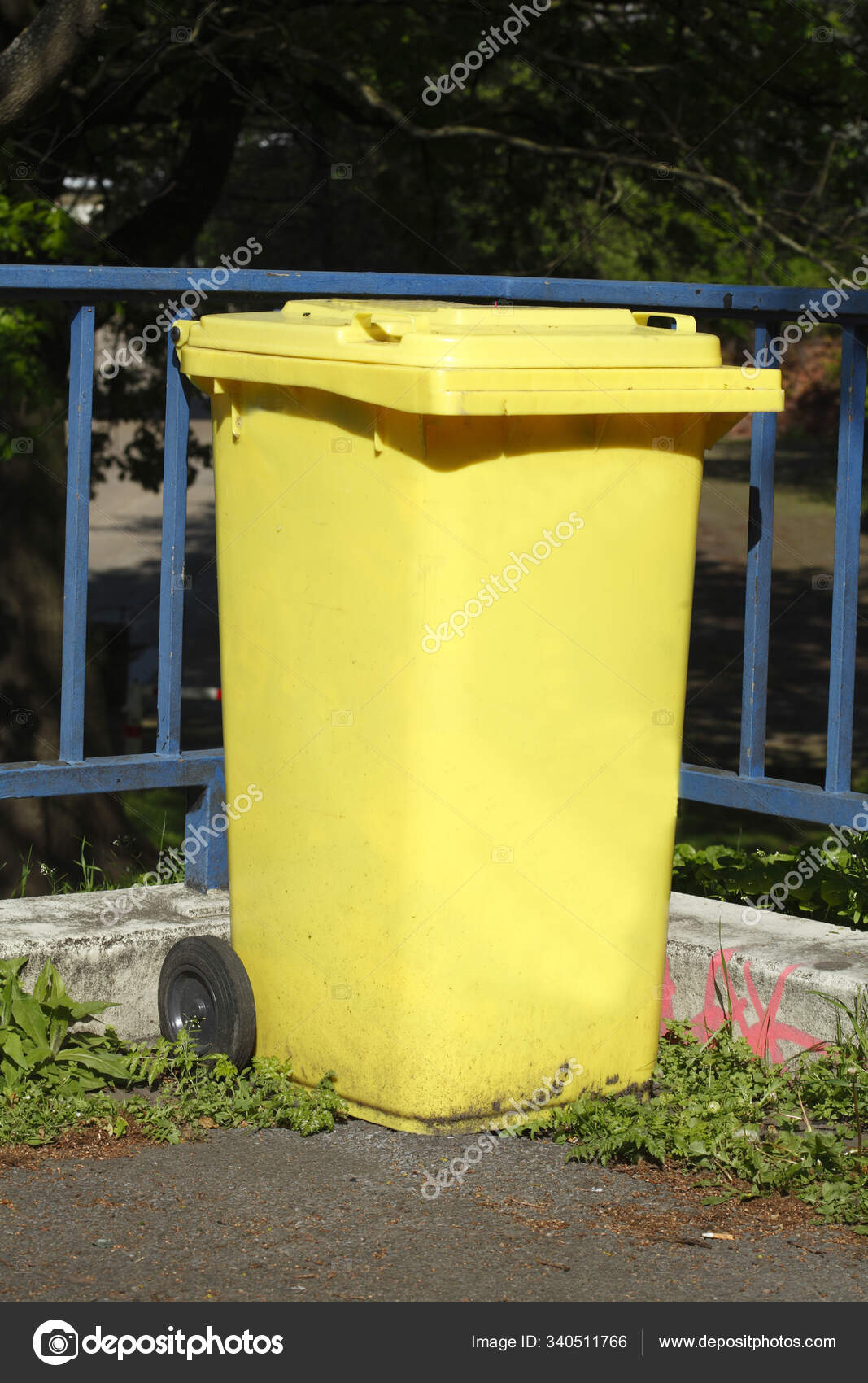 Yellow Recycling Bin Plastic Waste Stock Photo by ©PantherMediaSeller