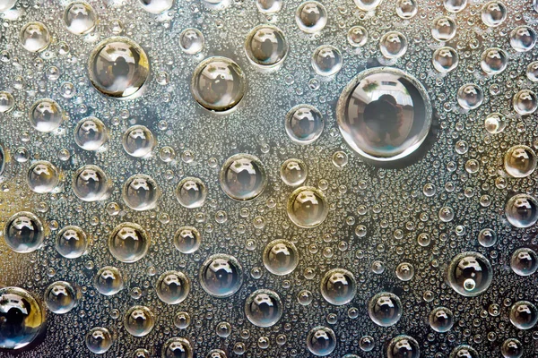 Fechar Gotas Água Fundo Tom Amarelo Azul — Fotografia de Stock