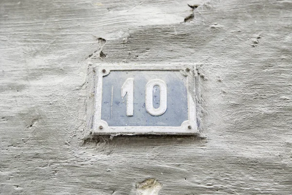 Numero Dieci Sul Muro Una Casa Dettaglio Una Serie Informazioni — Foto Stock