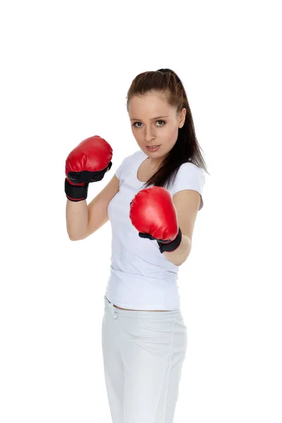 Αθλητική Νεαρή Γυναίκα Κόκκινα Γάντια Μάχης Λευκό Φόντο — Φωτογραφία Αρχείου
