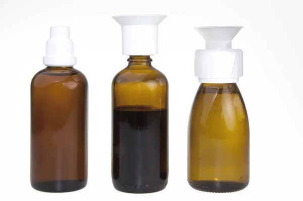 Three Brown Medicine Bottles — Stock Photo, Image