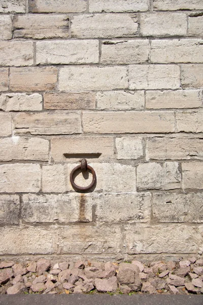 Limestone Brick Wall Old Iron Ring — стоковое фото