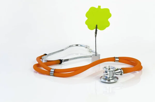 Orange Stetoskop Och Grön Klibbig — Stockfoto