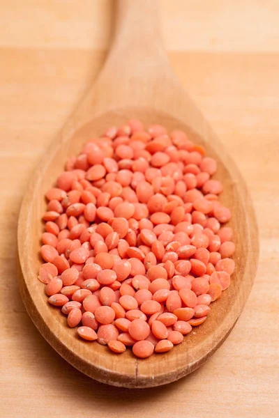 Closeup Red Lentils Wooden Spoon — Stock Photo, Image