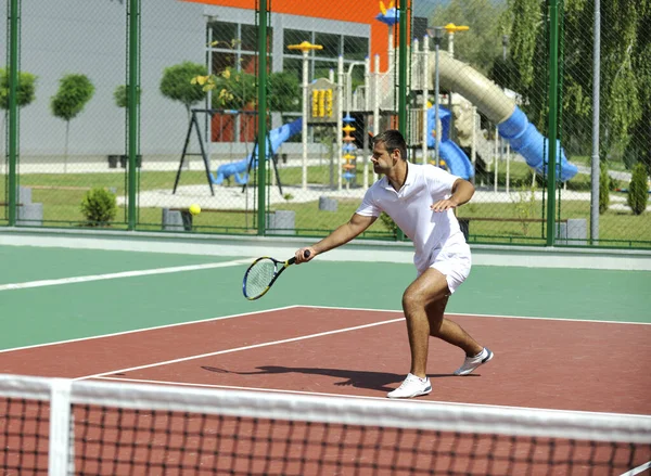 Young Man Play Tennis Outdoor Orange Tennis Court Early Morning Stock Photo