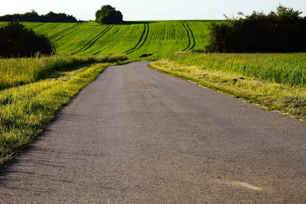 Uma Estrada Asfalto Campos Sol Noite Primavera Por Honzrath Saarland — Fotografia de Stock