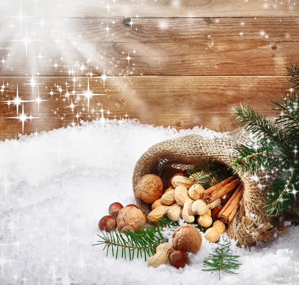 Festive Christmas Nuts Spices Tumbling Burlap Bag Fresh Winter Snow — Stock Photo, Image