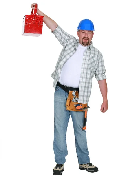 Worker Holding Aloft Toolbox — Stock Photo, Image