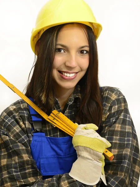 戴头盔的年轻女子 手持手杖的工作服 — 图库照片