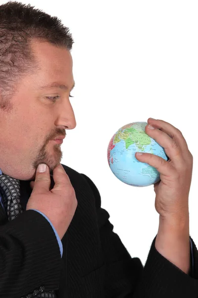 Zakenman Houden Een Globe — Stockfoto