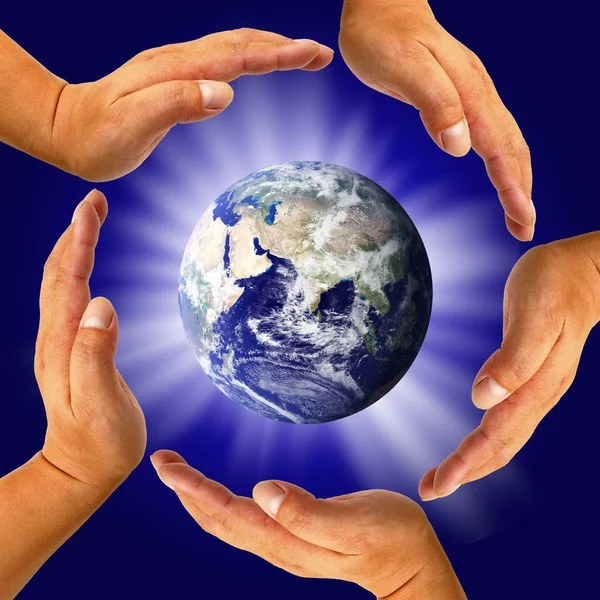 Male Hand Holding Earth Stock Picture