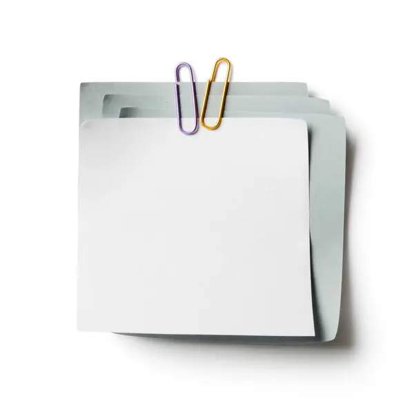 白とグレーのノートペーパークリップ付き白の背景 — ストック写真