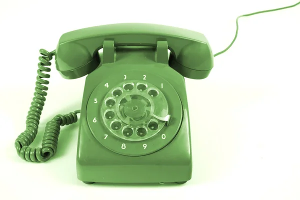 Beyaz Arkaplan Önünde Renkli Eski Bir Telefon — Stok fotoğraf
