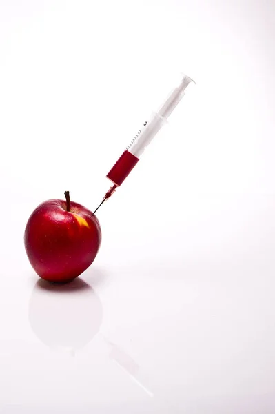 Una Manzana Roja Con Placa Delante Espalda Blanca — Foto de Stock