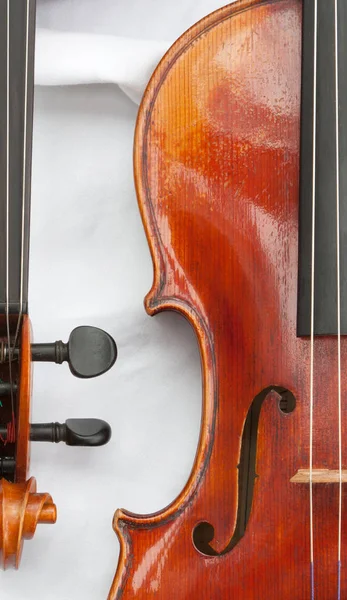 violin and bow on wooden table