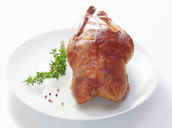 Whole Crisp Golden Roast Duck Served Plain White Plate Sprig — Stock Photo, Image