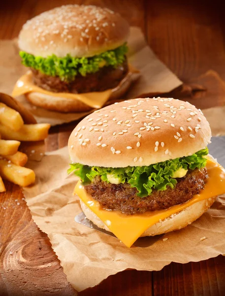 Two Hamburgers French Fries Brown Paper — Stock Photo, Image