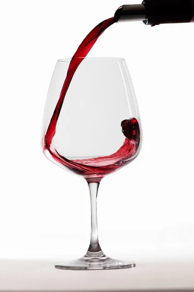 Red Wine Being Poured Botlle Big Glass — Stock Photo, Image