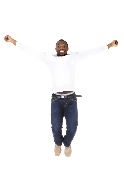 若いです幸せなアフロアメリカ人男性ジャンプで喜び上の白い背景 — ストック写真