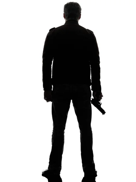 Ένας Άντρας Δολοφόνος Αστυνομικός Κρατώντας Όπλο Σιλουέτα Πίσω Όψη Στούντιο — Φωτογραφία Αρχείου
