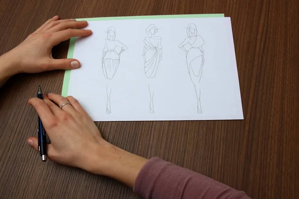 Designer Assessing Fashion Drawings Collection Clothes — Stock Photo, Image