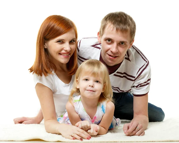 Νεαροί Γονείς Υπέροχη Κόρη Ξαπλώνουν Λευκό Φόντο Ευτυχισμένη Οικογένεια — Φωτογραφία Αρχείου