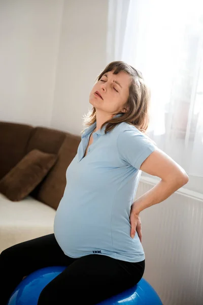 Pregnant Woman Sitting Fit Ball Backache Home — Stock Photo, Image