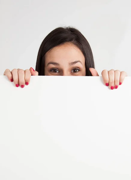 Young Brunette Caucasian Woman Holding Blank Sign Royalty Free Stock Images