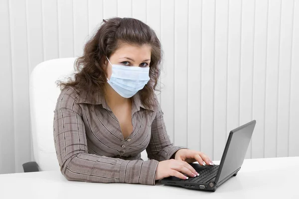 Young Woman Office Medical Mask Works Laptop Royalty Free Stock Images