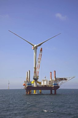 offshore wind power installation by ship clipart