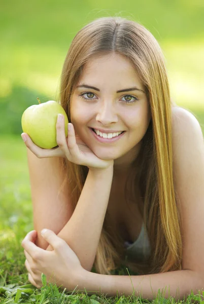 Young Smiling Woman Outdoors Holding Apple — Stock Photo, Image