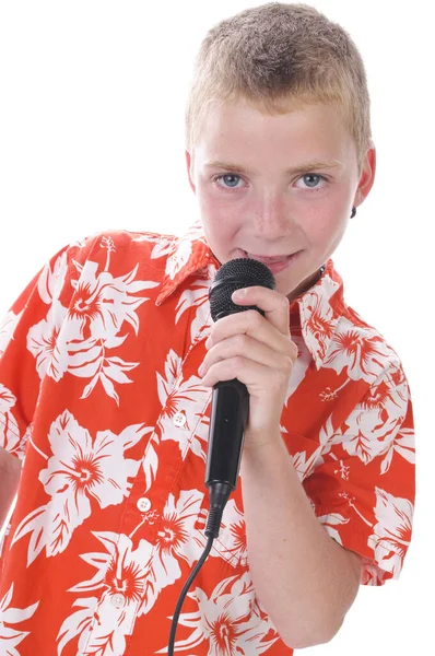 Blonder Teenager Leuchtend Orangefarbenem Hemd Und Singt Fröhlich Ein Mikrofon — Stockfoto