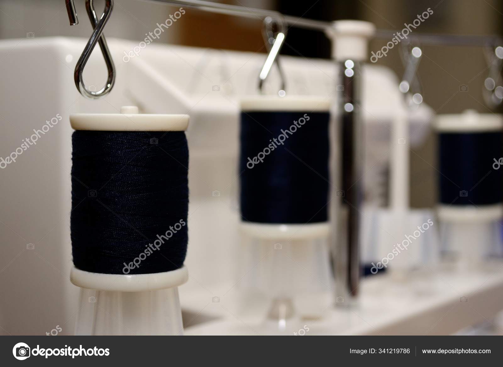 Black Yarn Rolls Sewing Machine Stock Photo by ©PantherMediaSeller 341219786