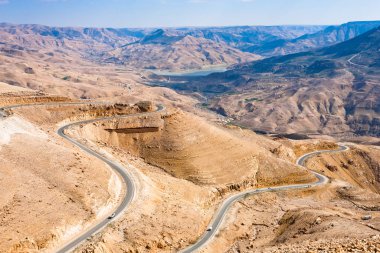 mountain serpentine King's road in Wadi Al Mujib valley, Jordan clipart