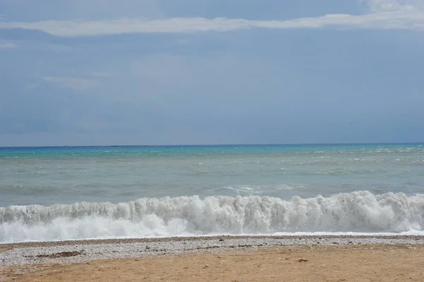 Stock image spain - unique beach with surf