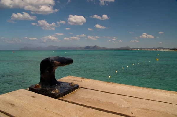 Small Wooden Bridge Black Bollard Stock Photo