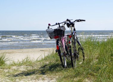 bicycles on the beach clipart