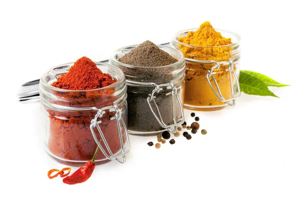 Three Glass Containers Filled Ground Culinary Spices Chilli Peppers Black — Stock Photo, Image