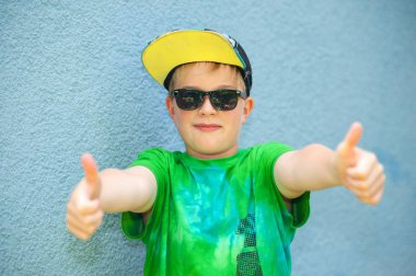 cool boy with thumbs up clipart